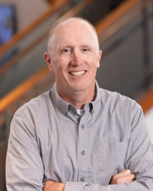 portrait of a smiling person in professional attire